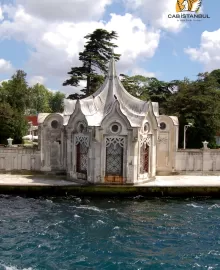 White marble façade of Beylerbeyi Palace seen from a boat on the Bosphorus