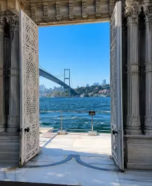 Ornate door of Beylerbeyi Palace opening toward the Bosphorus