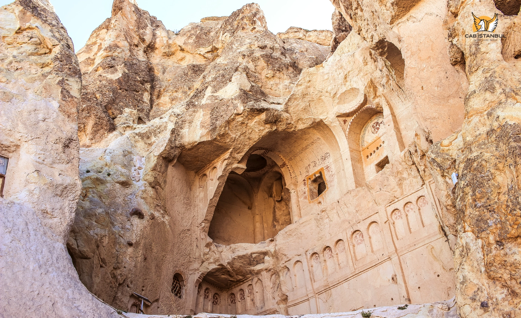Rock-cut church facade and openings at Zelve Open Air Museum