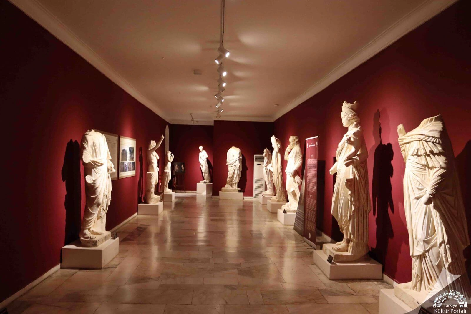 Former gallery interior with architectural and sculptural displays at Antalya Archaeological Museum