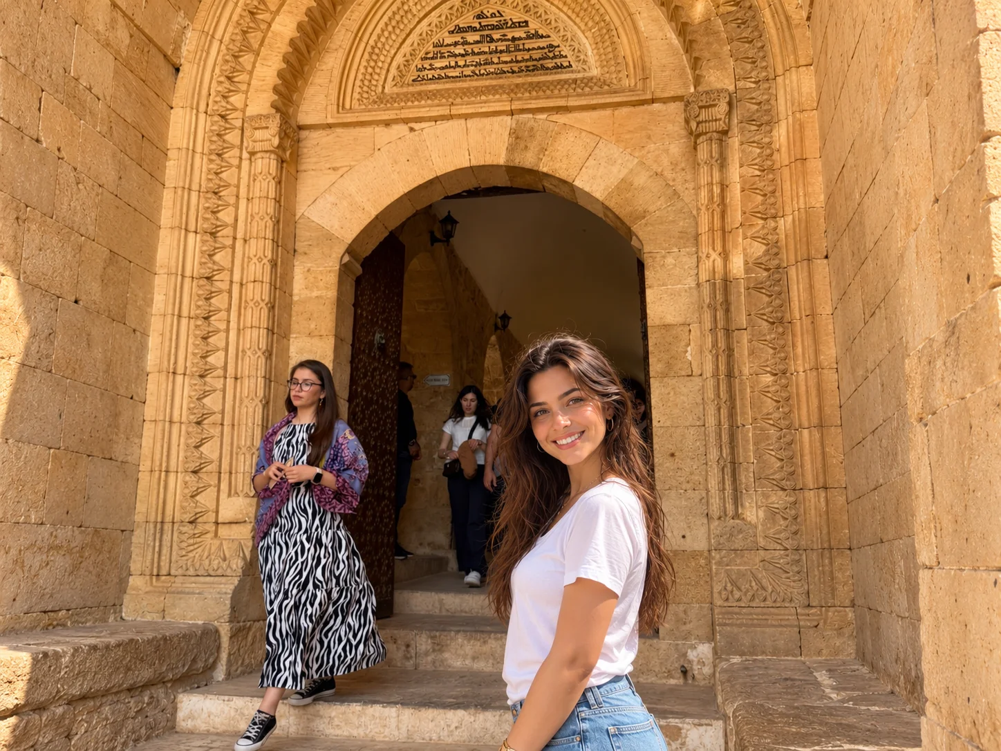 Carved arched portal at Deyrulzafaran Monastery, Mardin