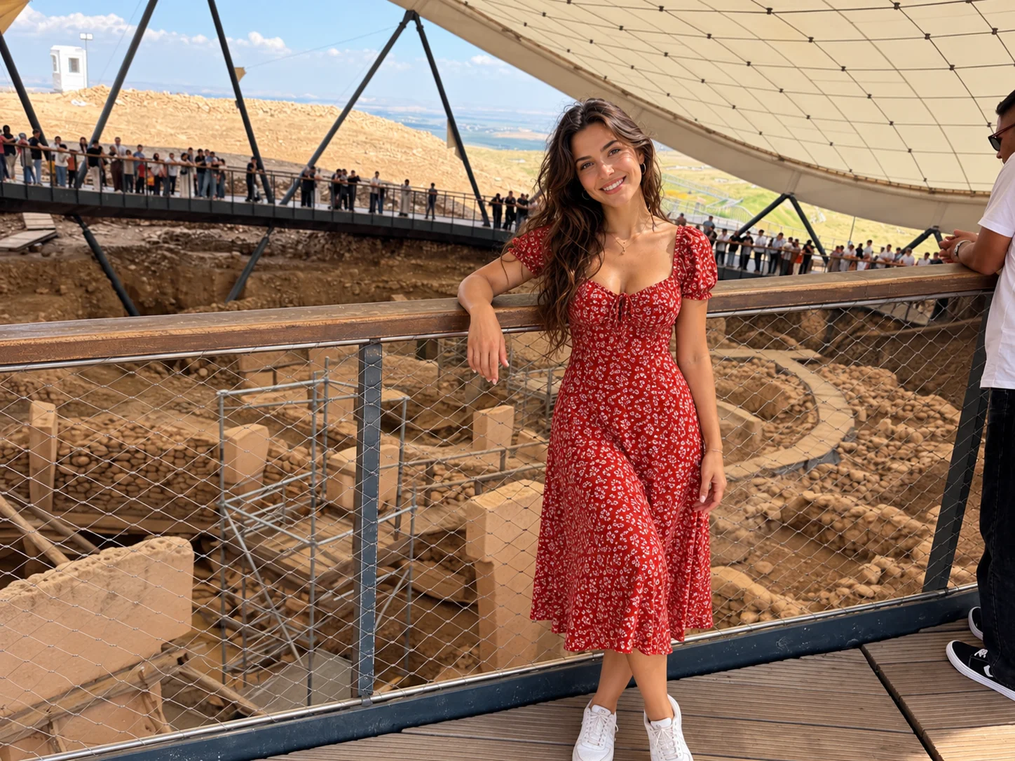 Wooden visitor walkway above T-shaped pillars under the canopy at Göbeklitepe