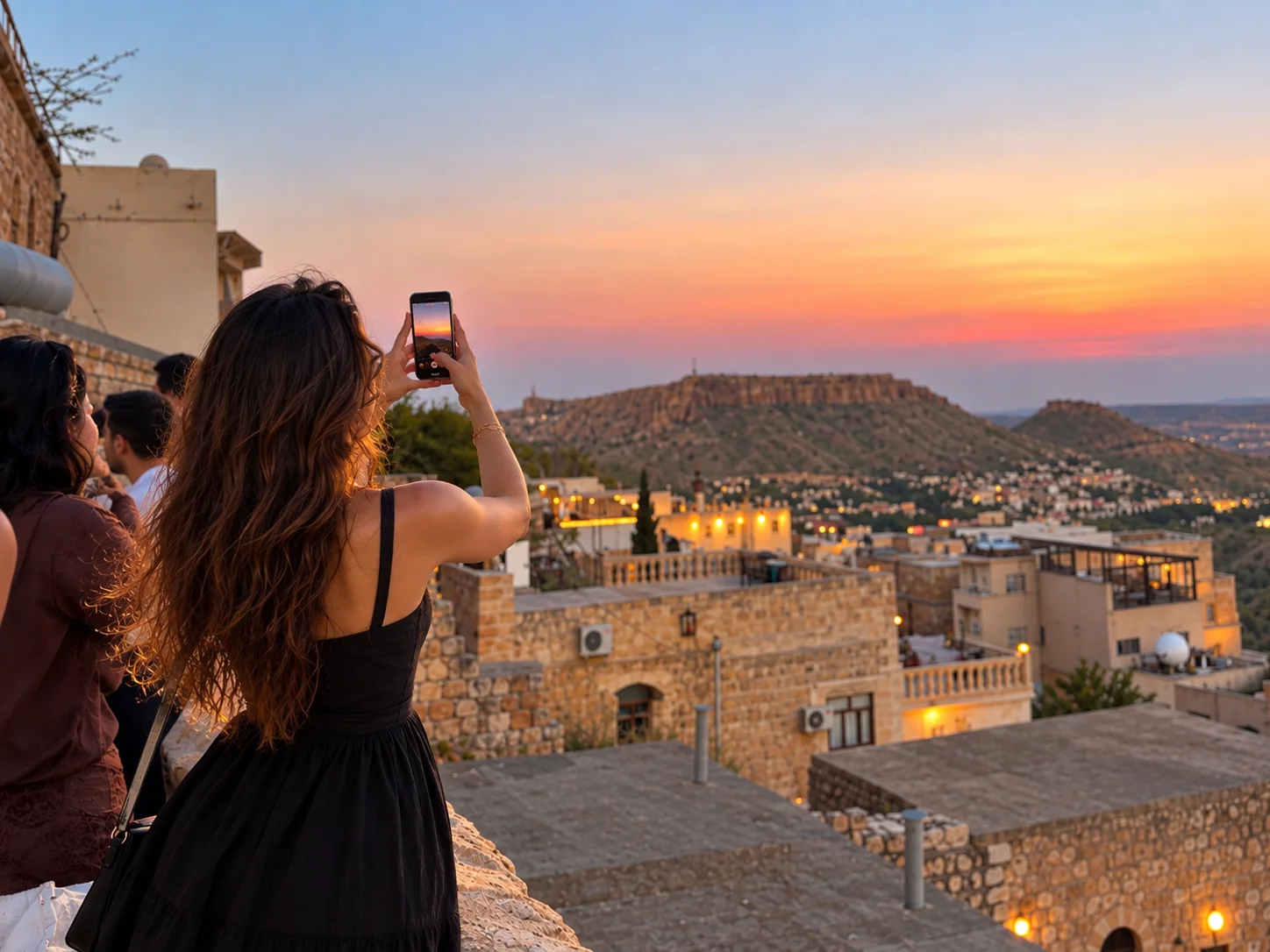 Stone terraces of Old Mardin looking across the plain at sunset